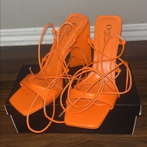EGO orange lace up block heels